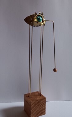 Oeil (bois et laiton) Oeil (bois et laiton)